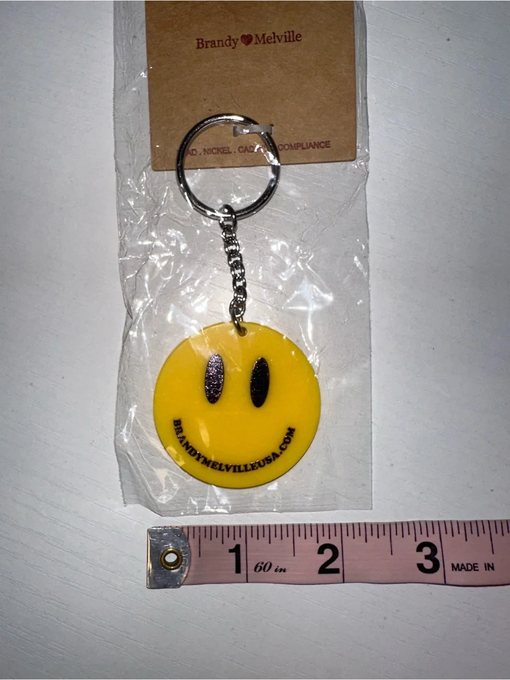 Brandy Melville Smiley Face Keychain